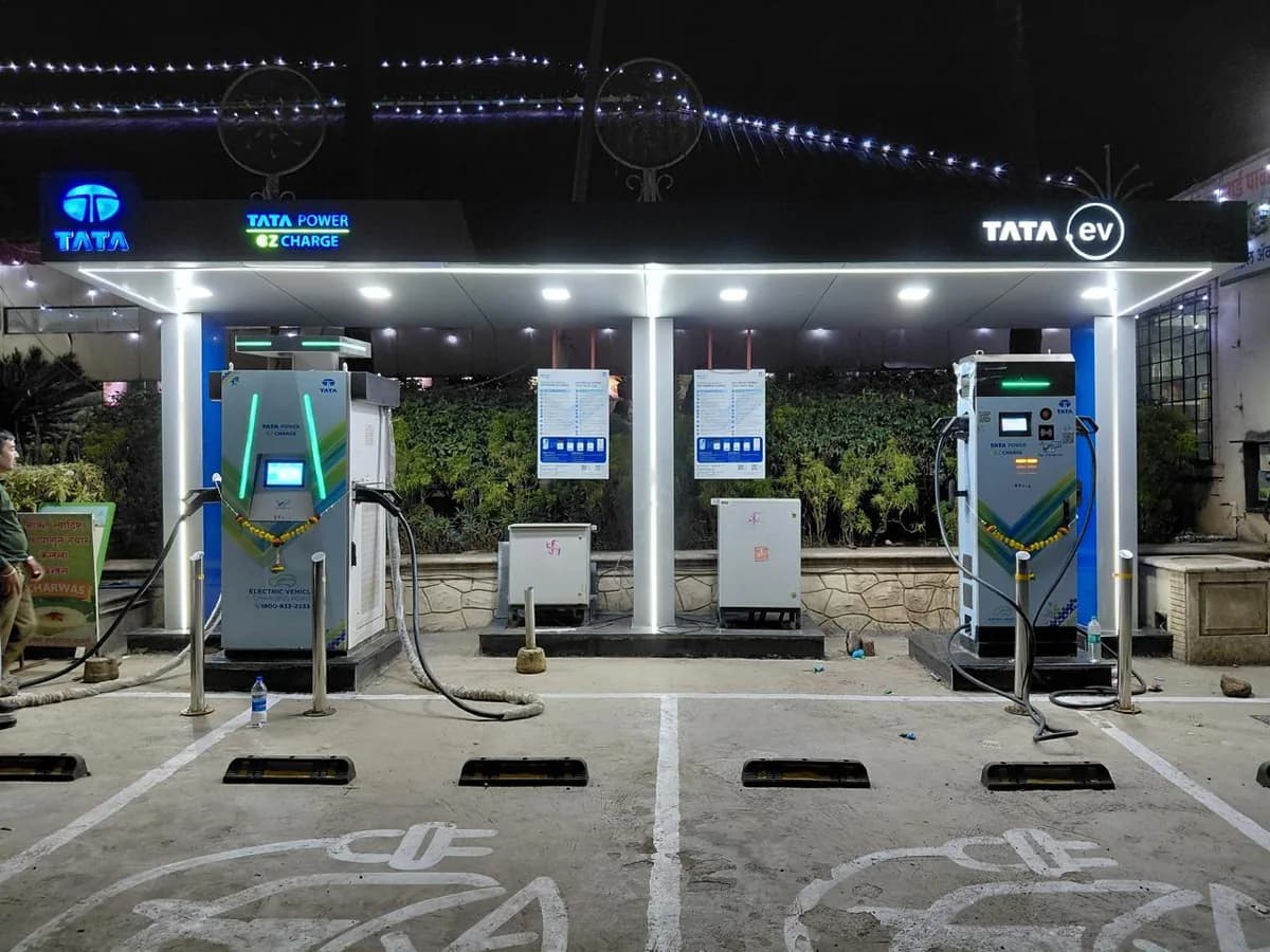 Tata Power EZ Charge DC charging bays under an illuminated canopy