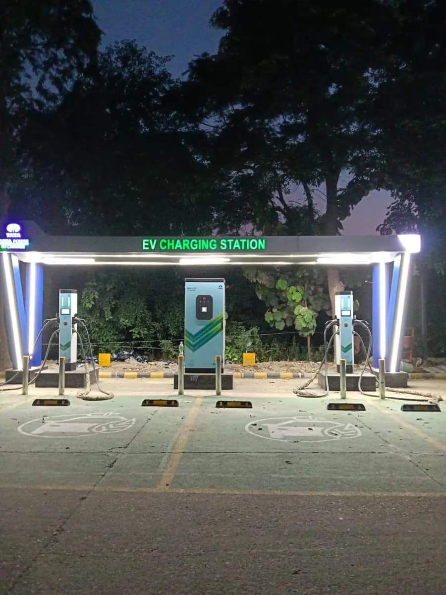 Tata EV charging station with multiple charging points at night
